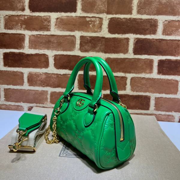 G*u*i gg matelassé leather top handle bag