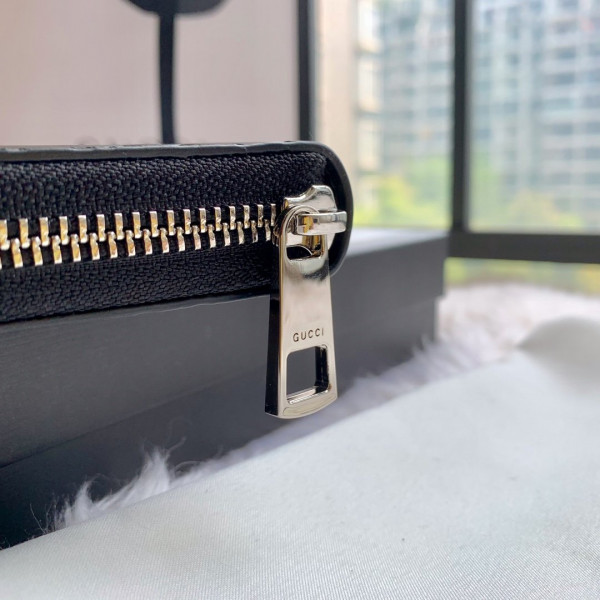 G*u*i leather zip around wallet