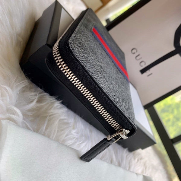 G*u*i leather zip around wallet