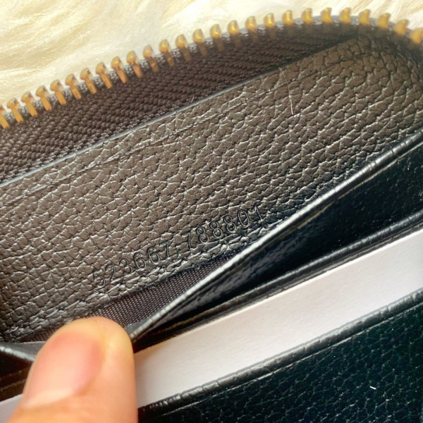 G*u*i leather zip around wallet