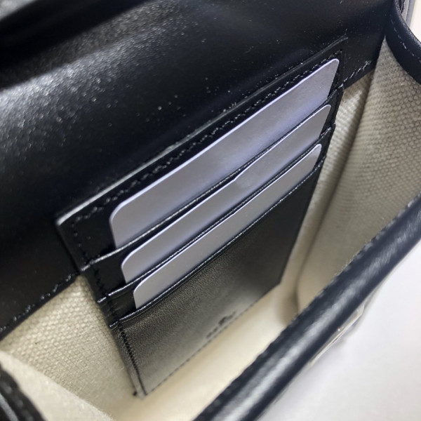 G*u*i gg embossed mini bag