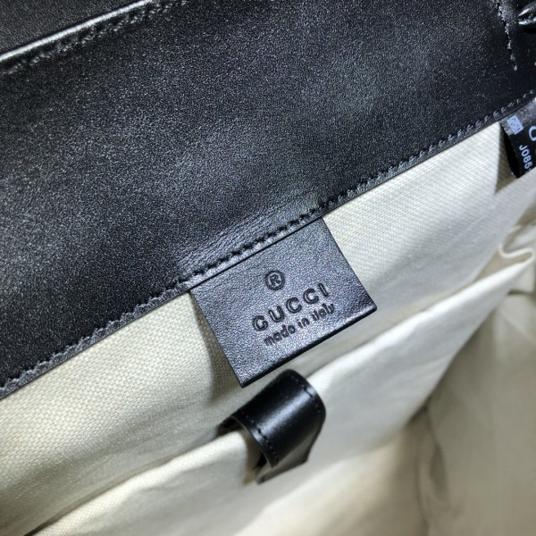 G*u*i gg embossed backpack