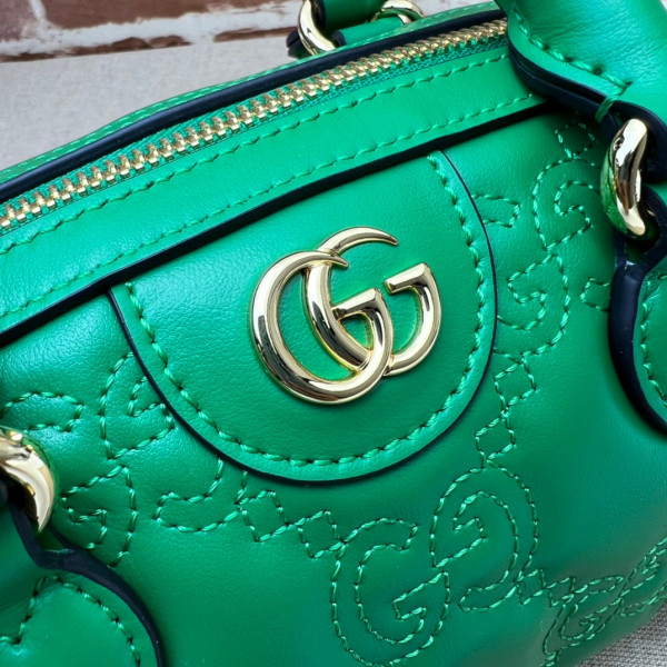 G*u*i gg matelassé leather top handle bag