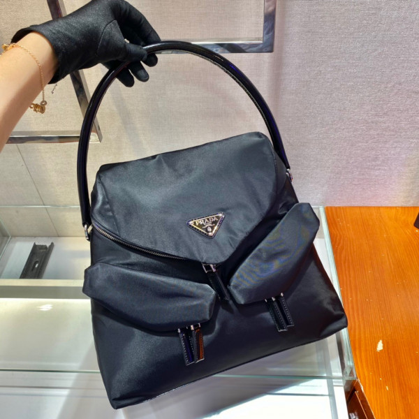 Pra*a signaux nylon and leather hobo bag