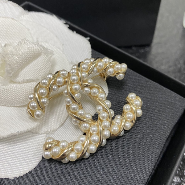 CL BROOCH