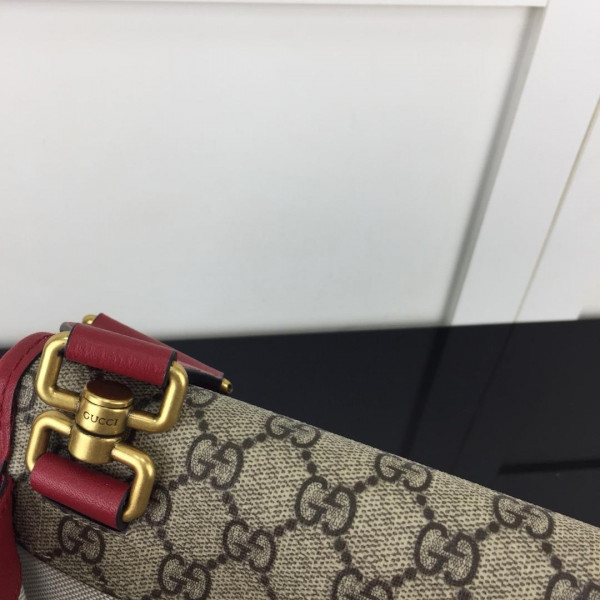 G*u*i gg messenger bag
