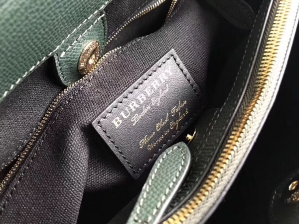 B**rry the medium banner in leather and house check