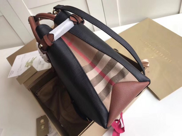 B**rry the medium banner in leather and house check