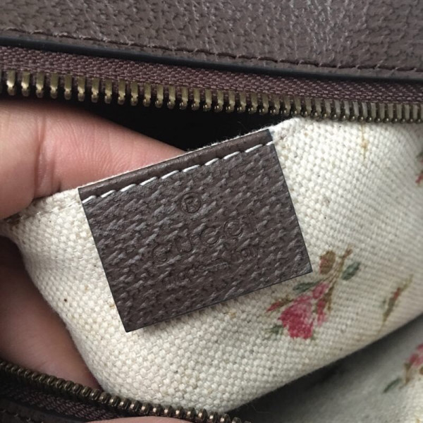 G*u*i gg messenger bag
