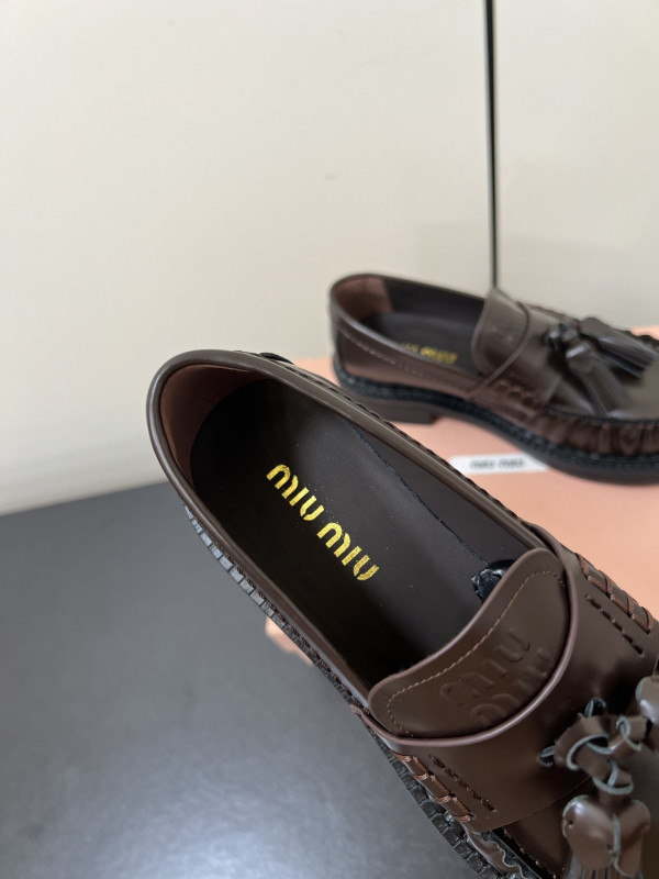M*um*u loafers