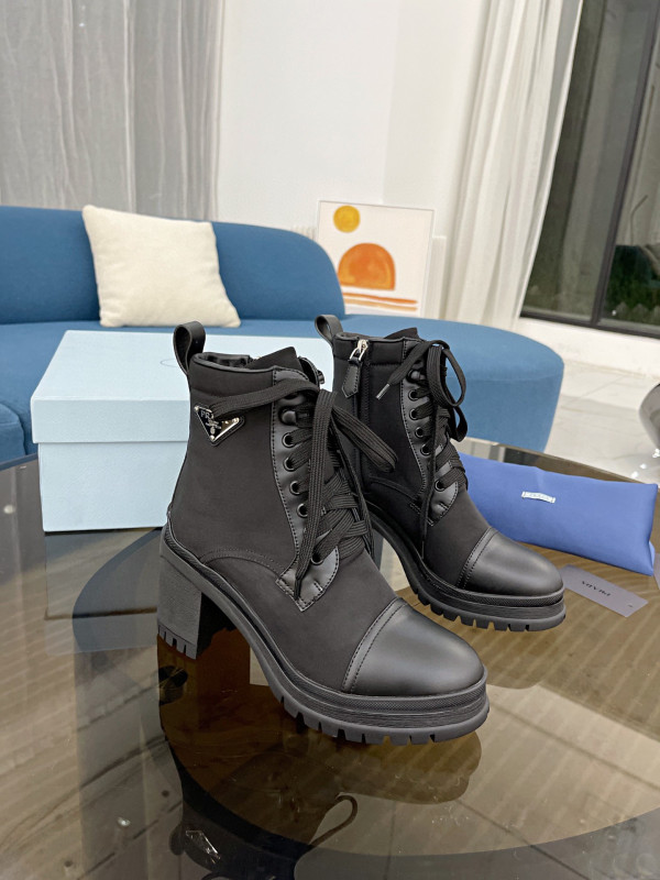Pra*a brushed leather and nylon laced booties