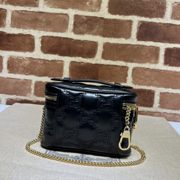G*u*i gg matelassé top handle mini bag