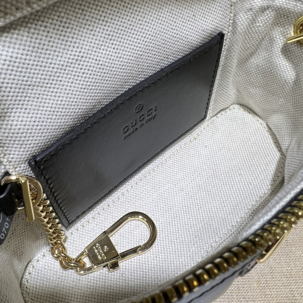 G*u*i gg matelassé top handle mini bag