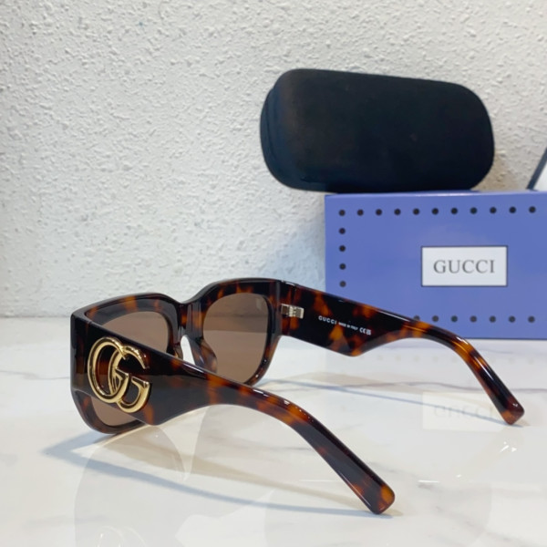 G*u*i sunglasses