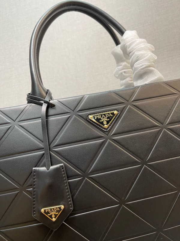 Pra*a symbole large leather bag $ 4,200