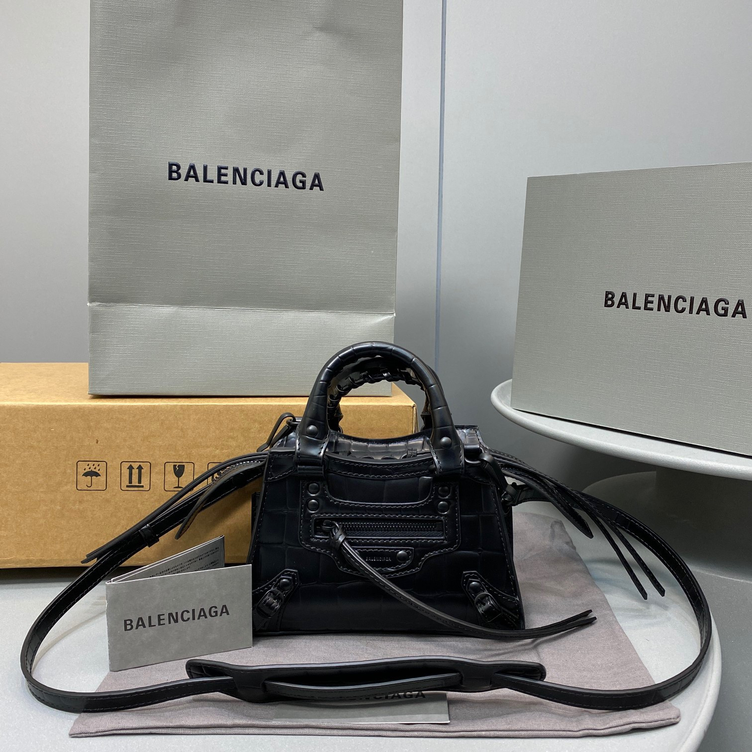 Ba*len*cia*ga neo classic nano top handle bag