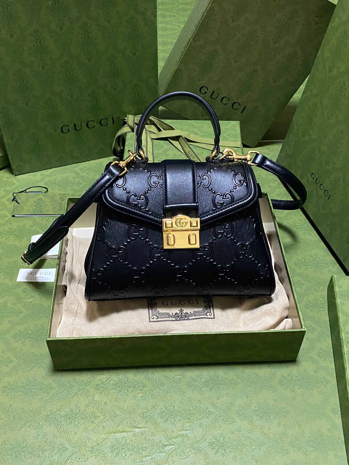 G*u*i small gg top handle bag