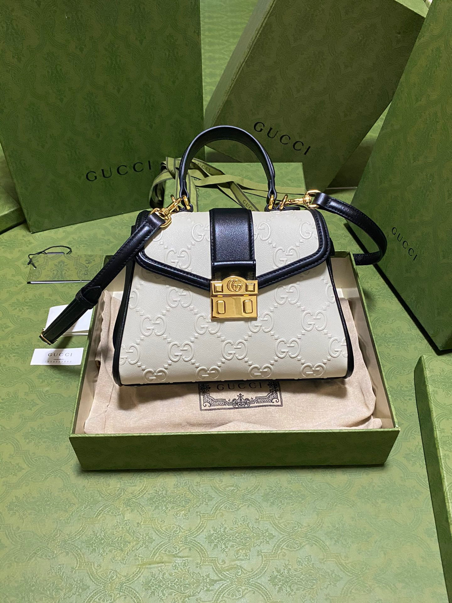 G*u*i small gg top handle bag