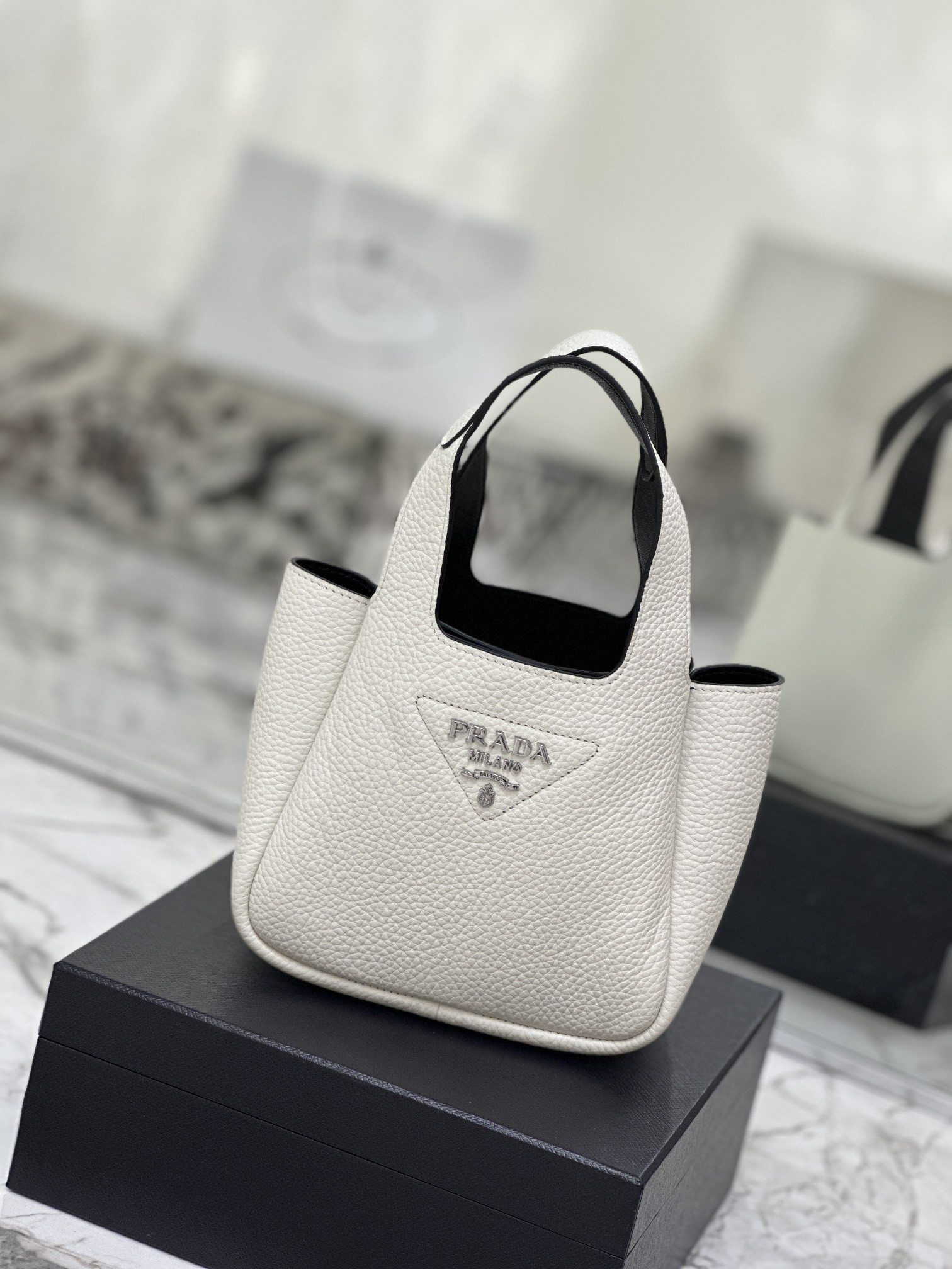 Pra*a leather mini bag