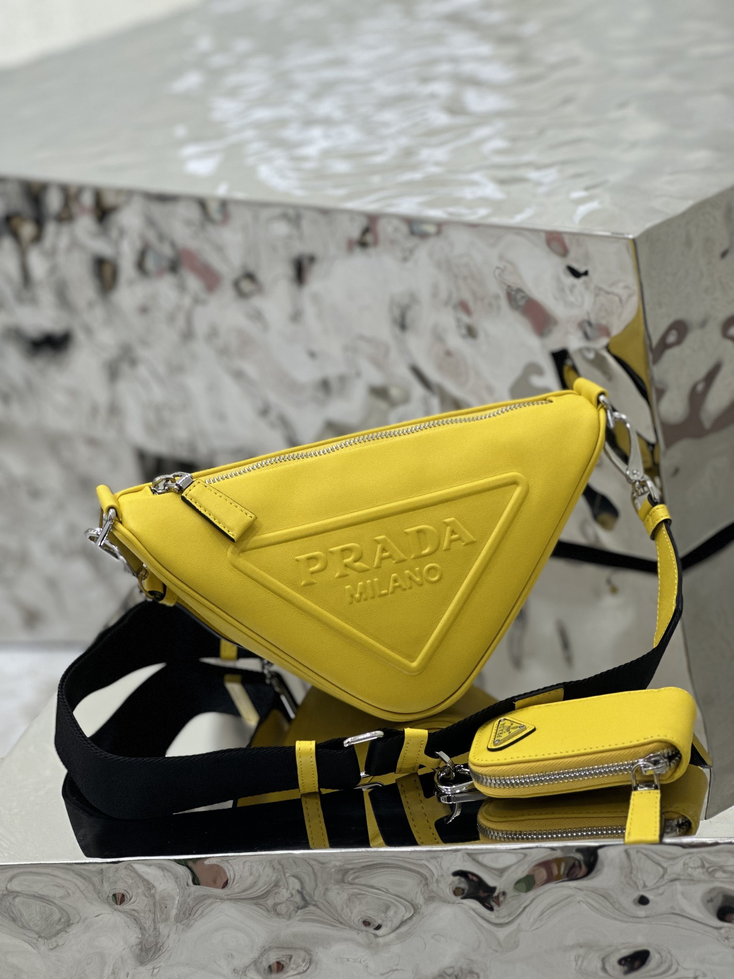 Pra*a triangle bag